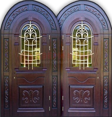 Индивидуальная арочная дверь со стеклом и ковкой ДА-19 в Красногорске