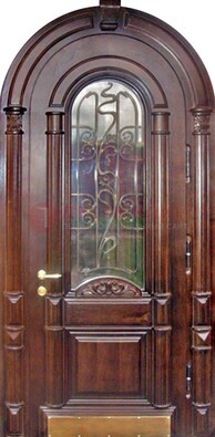 Арочная металлическая дверь массив со стеклом и ковкой ДА-50 в Красногорске