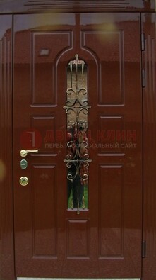 Красивая металлическая дверь со стеклом и ковкой ДСК-33 в Красногорске