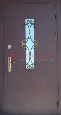 Металлическая дверь со стеклом и ковкой ДСК-77 в Красногорске