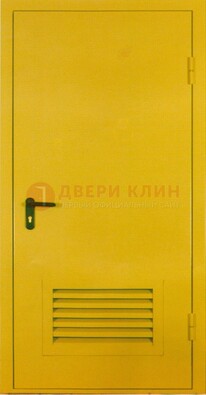 Желтая металлическая противопожарная дверь с вентиляционной решеткой ДТ-15 в Красногорске
